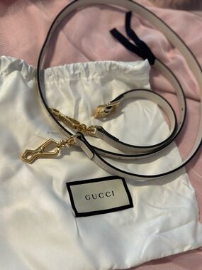 Gucci White and Black Leather Strap with Gold Hardware